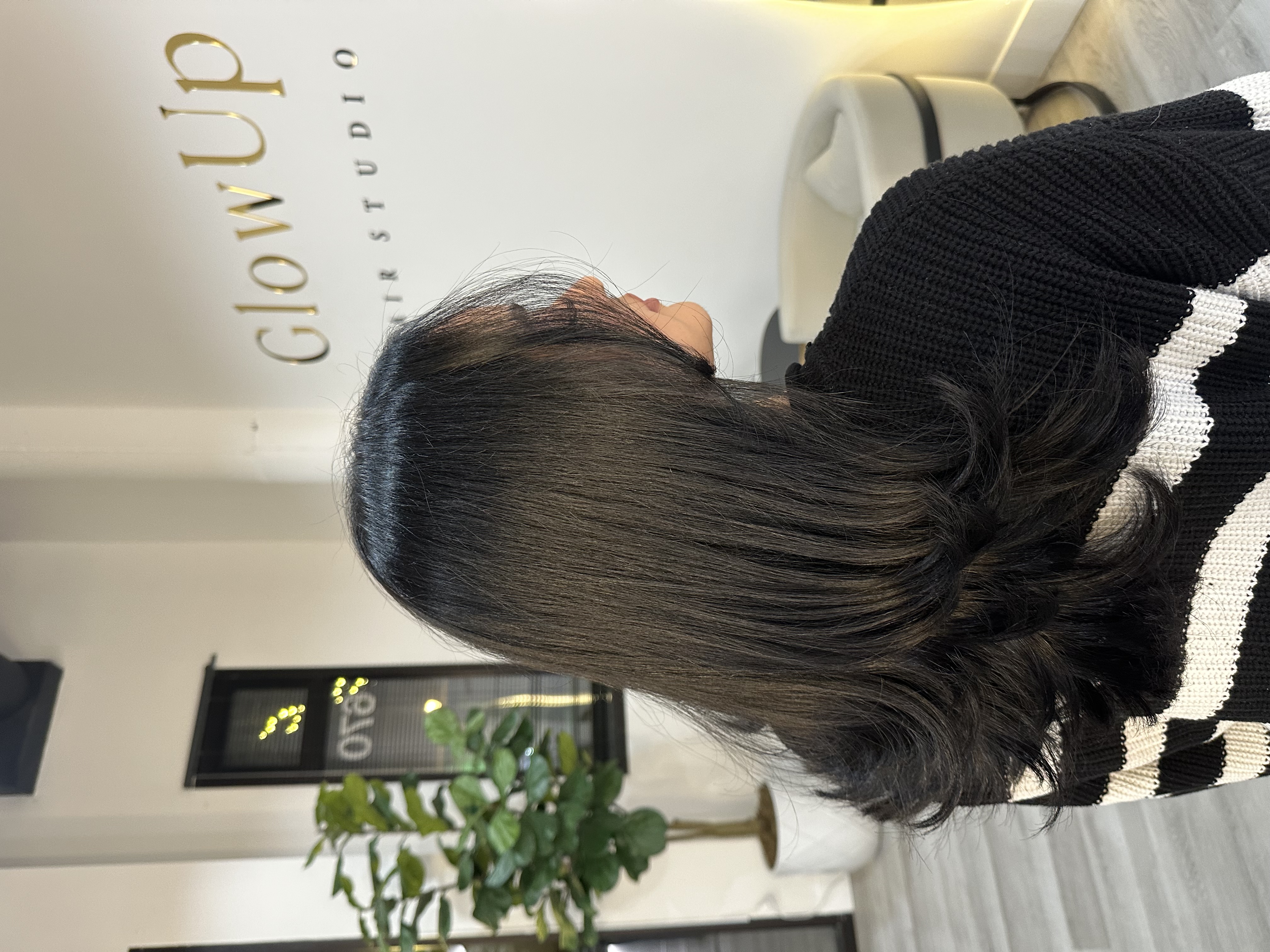 Glossy brunette finish at Glow Up Hair Studio